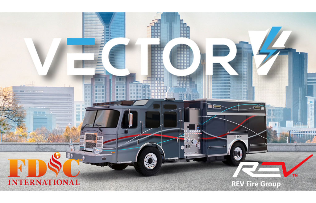 Photoshopped image of the Vector Fire Truck on a city background with Vector logo, FDIC logo and REV Fire Group logo