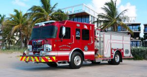 Spartan Emergency Fire Truck in front of a building in Palm Beach