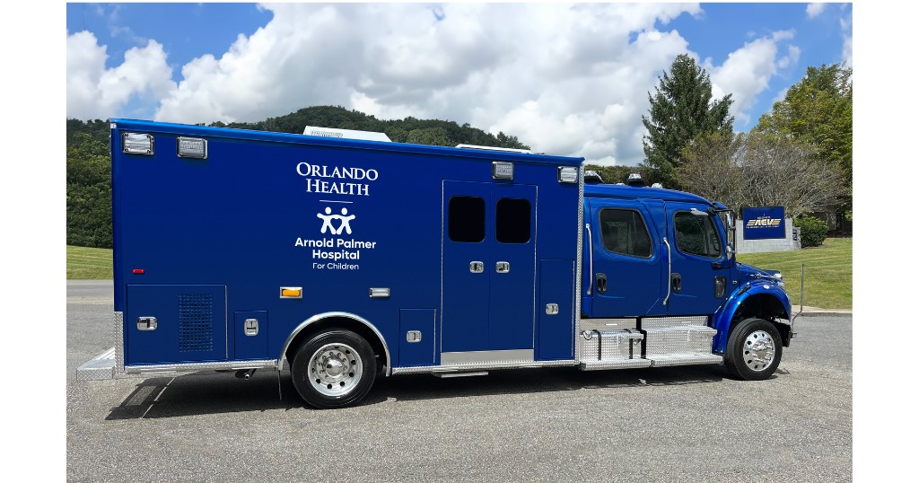 Blue ambulance parked outside